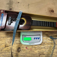 Mini Wooden Finish Plastic Guitar Music Instrument with 4 strings Clear sound